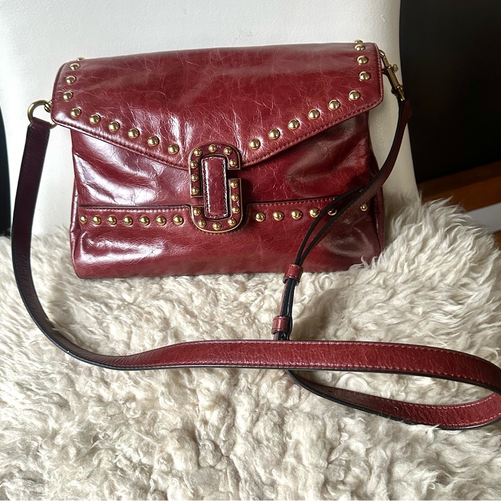 Marc Jacobs Limited Edition Burgundy brown gold Studs distressed leather Bag.